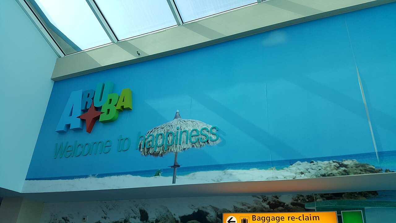 Arrivals pickup zone for an Aruba airport transfer